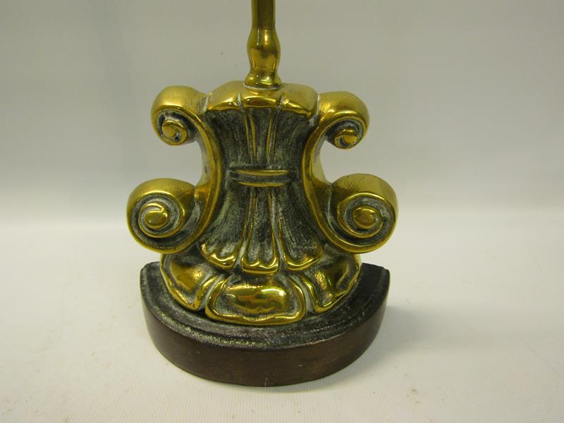 A 19c brass and iron doorstop with central carry handle. 38cms h. - Image 2 of 4