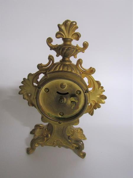 A late 19c American mantel clock by the Amsonia Clock Co. in rococo cast gilt case embellished - Image 3 of 3