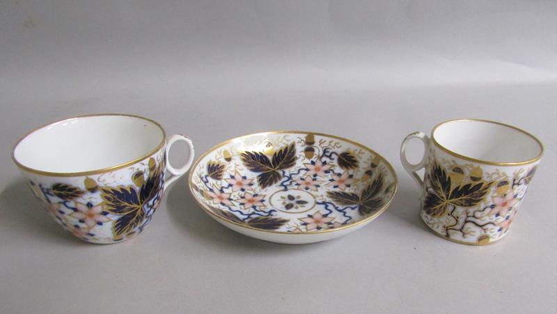 An early 19c Newhall trio of tea cup, coffee can, and saucer pattern no. 1161. cup 6cms h. - Image 2 of 4