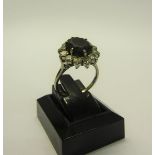 A platinum Diamond and Sapphire set ring - ring size Q