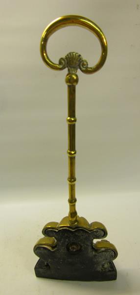 A 19c brass and iron doorstop with central carry handle. 38cms h. - Image 3 of 4