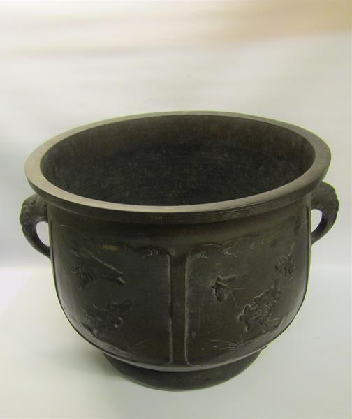 A 19c Oriental patinated bronze jardinere of bulbous form with Elephant trunk side handles and - Image 2 of 8