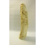 A late 19c Oriental carved figure of a warrior. 36.5cms h.