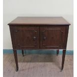 A 19c mahogany bedroom cabinet of rectangular form with moulded top edge, fitted shelf and