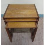 A nest of three G Plan teak occasional tables, the largest 53cms w x 49cms h.