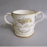 A late 19c two handled christening mug, painted on one side with a spray of English flowers and on