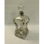 A late 19/early 20c clear glug glug decanter, decorated with cased open silver work with stopper.