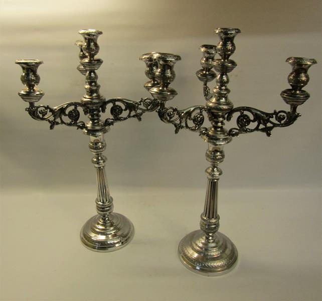 A pair of 19c silver three branch candelabra's with knot fluted tapering columns and raised on - Image 2 of 6