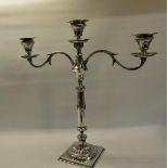 A late Victorian silver two branch candelabra, makers mark for William Jackson and Peter Henderson