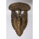 A 19c carved wooden stucco gilded wall bracket supported by a swan with open wings. 37cms w x