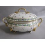 An early 19c Derby tureen and cover decorated with Chantilly sprigs and applied with gilt lion masks