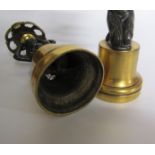 A pair of late 19c ormolu and patinated bronze figurine candlesticks with swag cast socles on