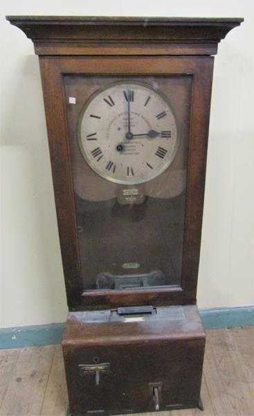 Early 20c English factory clocking in clock by Gledhill Brook Time Recorders, Halifax. The stained