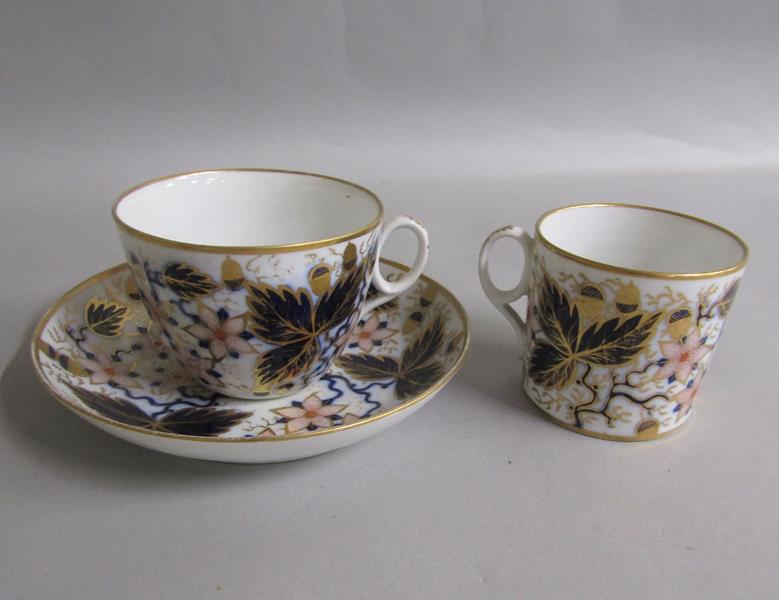 An early 19c Newhall trio of tea cup, coffee can, and saucer pattern no. 1161. cup 6cms h.