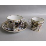 An early 19c Newhall trio of tea cup, coffee can, and saucer pattern no. 1161. cup 6cms h.