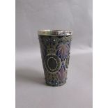 A Doulton Lambeth Arthur Pearce silver rimmed beaker with incised foliate decoration and four