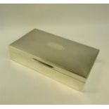 A 20c silver cigarette box of rectangular form, the hinged cover engine turned. Makers mark for