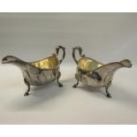 A pair of late 18/early 19c Irish silver sauceboats with Dublin and Britannia mark, but no date
