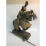 A late 19c miniature Knight's armour for man and horse in 16c style, the horse of carved wood fitted