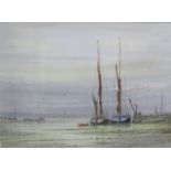Alan Whitehead - beached sailing vessels at the quayside, watercolour. Signed, framed and glazed