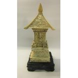 A late 19c carved ivory Pagoda shrine, 25cms h.