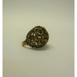 A 1950s 9ct gold rubble ring - ring size M/N. 9.5g.