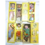 Six various boxed Pelham puppets including Dutch girl, Giant,