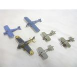 A German tinplate clockwork aircraft with folding wings,