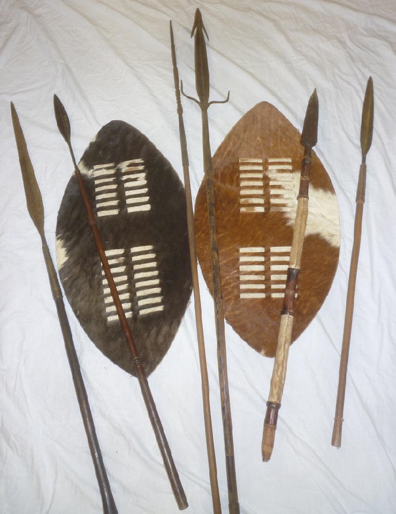 A selection of various African spears including three assegai stabbing spears,