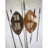 A selection of various African spears including three assegai stabbing spears,