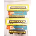 Trix OO-gauge - four mint and boxed coaches