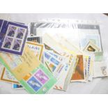 A selection of unmounted World mini sheets of stamps