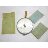 An American Air Instruments of Boston aircraft plotting compass together with pilot's notes for