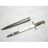 A Switzerland model 1889 bayonet with single-edged blade in steel scabbard