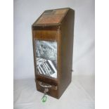 An old wooden postcard vending machine,