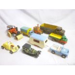 A selection of various metal and tin-plate toys including Tri-ang Jeep with caravan,