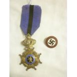 A Belgian Order of Leopold II silver and enamelled medal and a German Nazi Party badge (2)