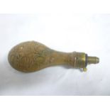 A 19th Century brass mounted copper powder flask with raised scroll decoration by G & JW Hawksley