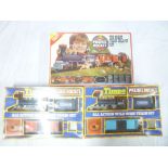 Two Timpo Prarie Rocket Wild West train sets and one other,