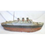 An unusual 1920's tin-plate and wood model liner,