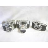 Three 35mm cameras including Samoca-35;