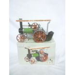 A Mamod steam tractor in original box