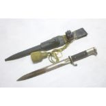 A Second War German Parade bayonet with single-edged blade in steel scabbard with leather frog
