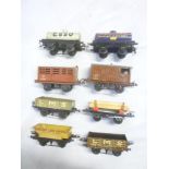 Hornby O-gauge - eight various goods wagons including Red Line Super Petrol tanker, Esso tanker,
