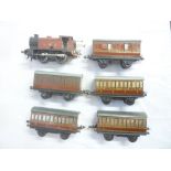 Hornby O-gauge - LMS clockwork reversing tank locomotive and five tin-plate LMS coaches