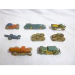 A selection of old tinplate clockwork vehicles including clockwork Landspeed Record car,