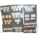 Various stock cards containing a collection of South Africa stamps including sets and Revenue