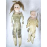An early porcelain headed child's doll with glass eyes, open mouth and leather body 12" long,