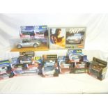 A selection of mint/boxed Corgi James Bond 007 diecast vehicles including Jaguar XKR, Mustang Mach1,