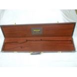 A modern vinyl lined rifle carrying case by Wincester,